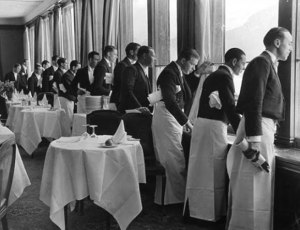 Waiters+all+look+out+of+window